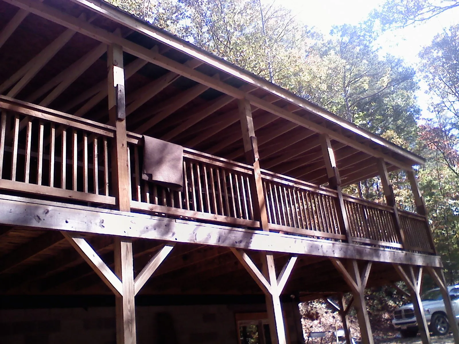Timber framing under a new elevated porch and deck — Roof Leak Repair in Saint Hilaire by Roofing Brothers